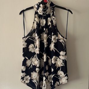High-neck Navy halter top with tan/white flowers 🌸